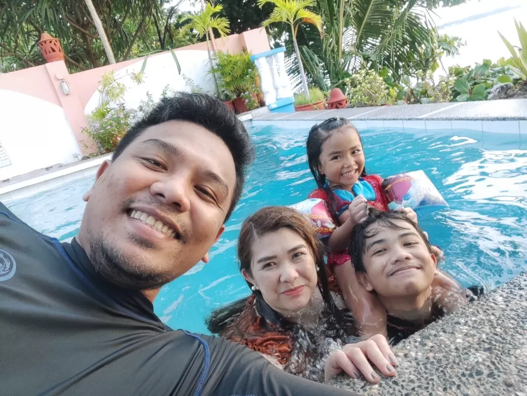 Family in a swimming pool