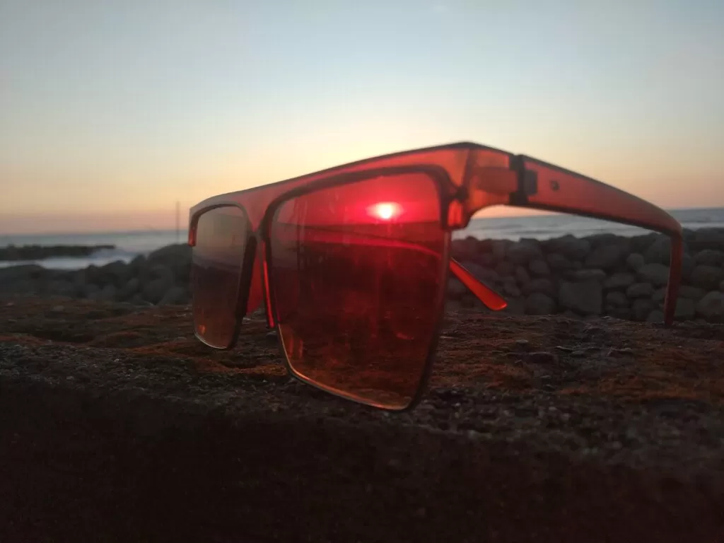 Sun Glasses covering the sunset